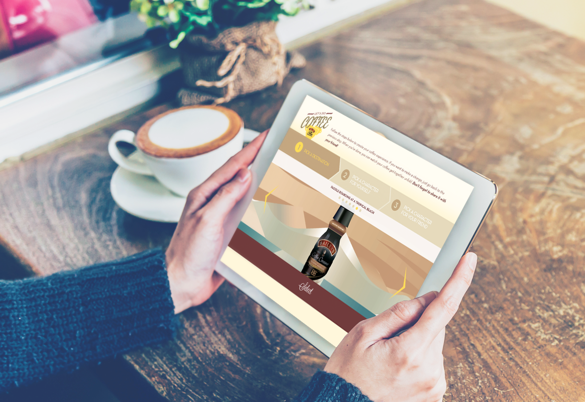 Person sitting at a wooden table with a latte holding a tablet displaying Let's Do Coffee landing page