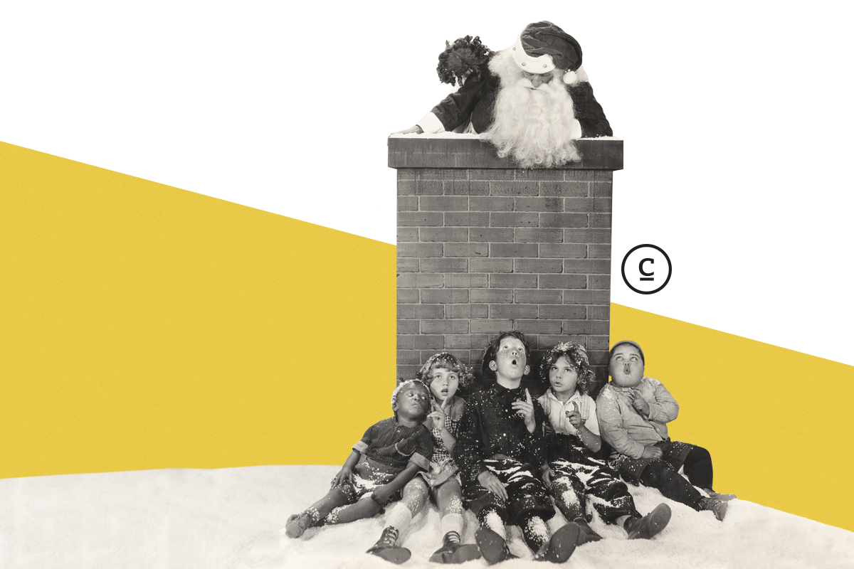 santa popping out of a chimney with surprised children