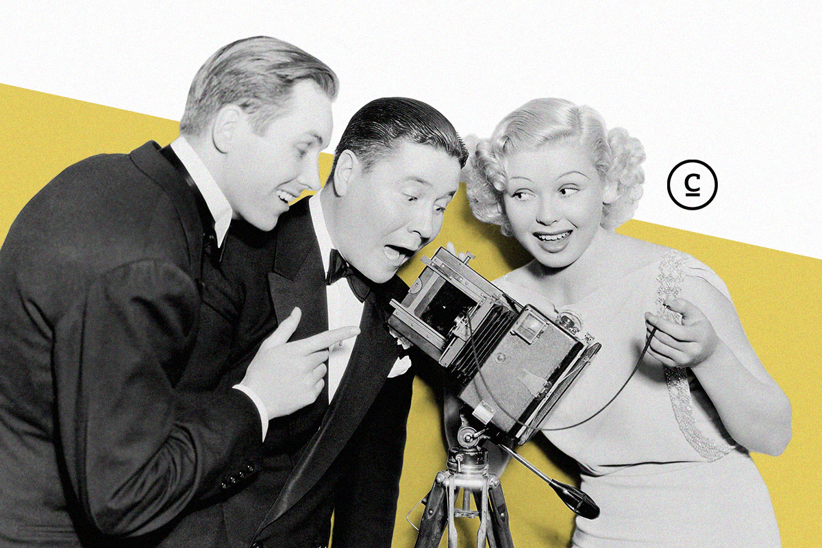 vintage photo of two men and woman looking at camera