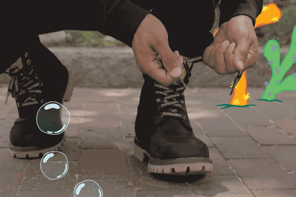close-up of man tying shoelaces surrounded by animated bubbles